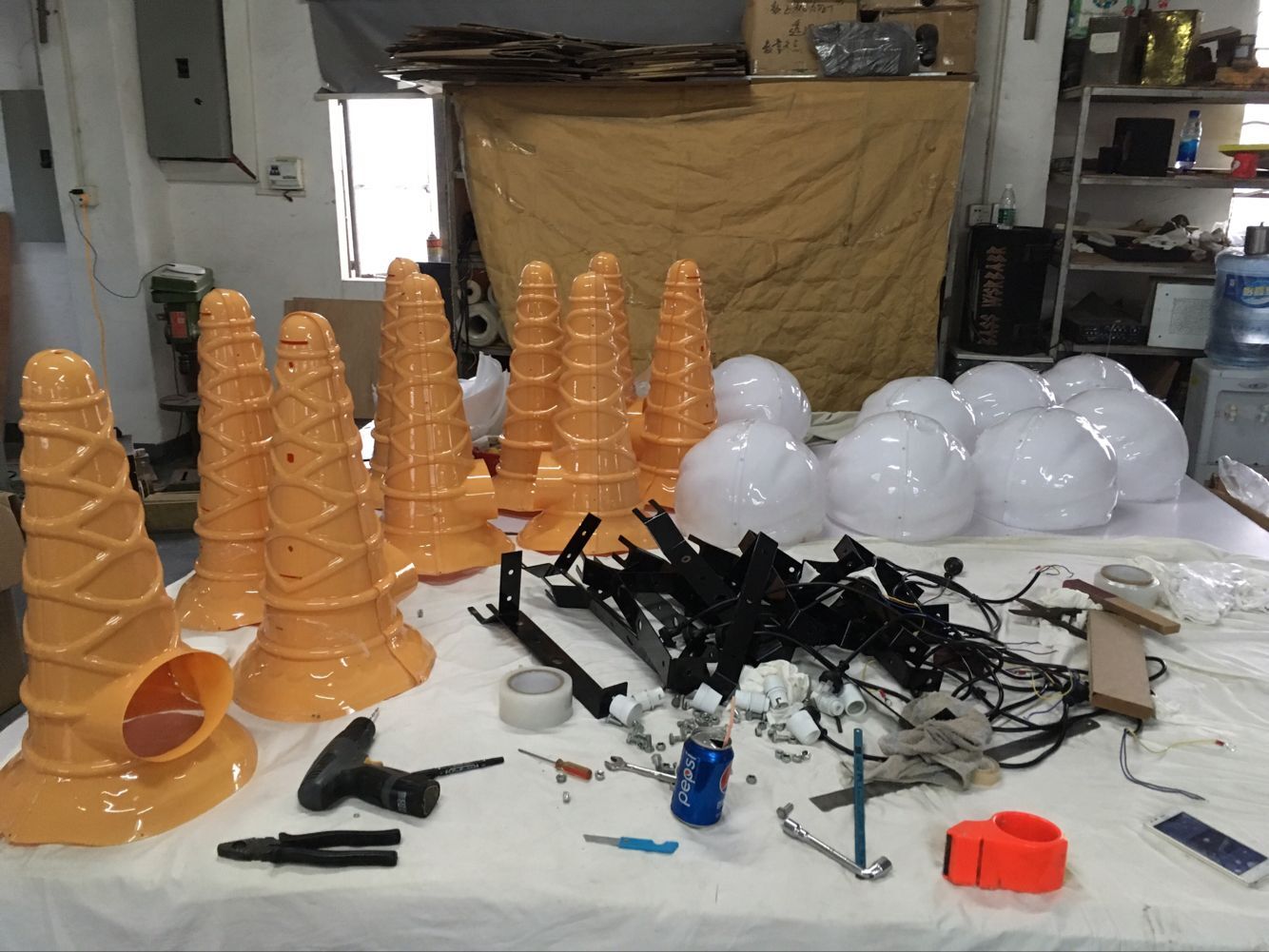 Mass production of vacuum formed consumer product shells